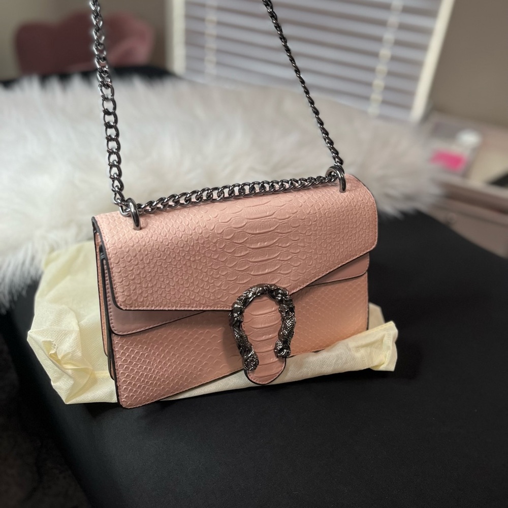 Snake printed leather bag